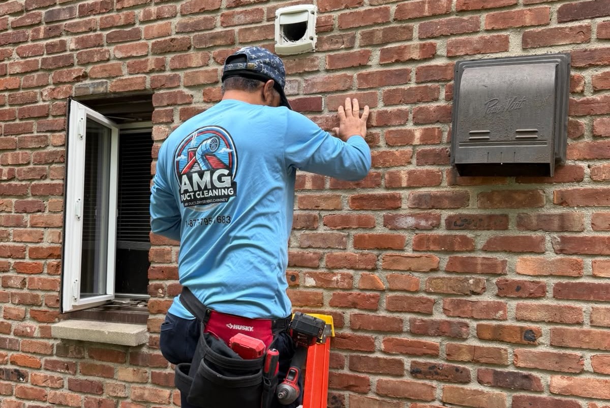 AMG Duct Cleaning Cherry Hills technician servicing air ducts in a New Jersey home