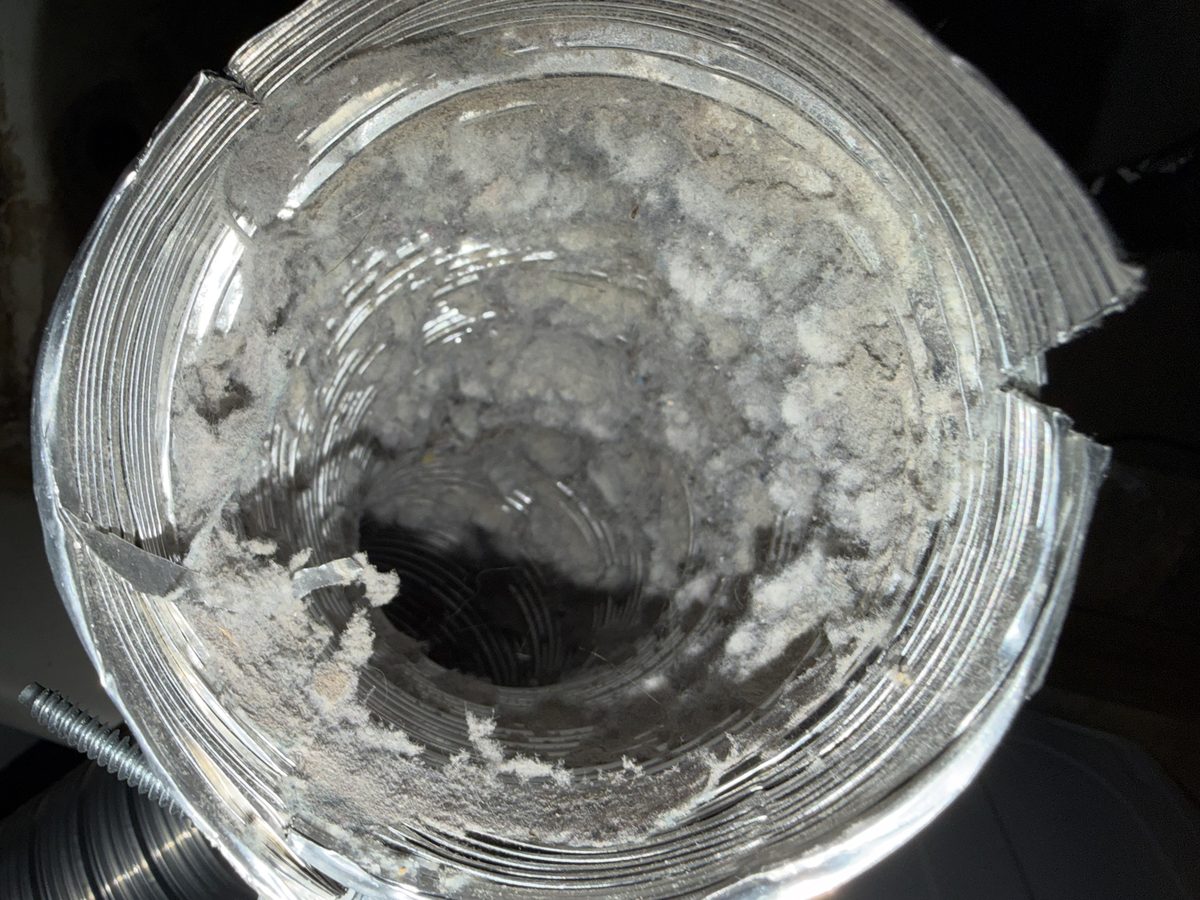 Lint clinging to the ribs inside a foil flex duct